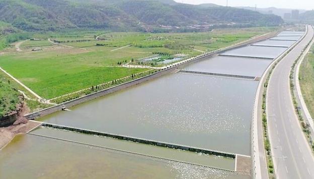 昕水河7道沉沙降污攔水壩與昕水河濕地公園連片成景